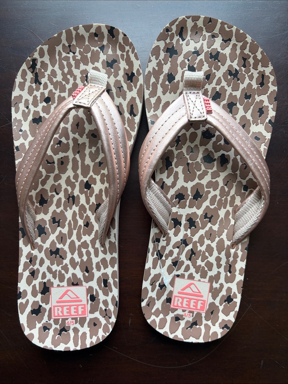Reef Kids Leopard Print Flip Flops in Brown and Black